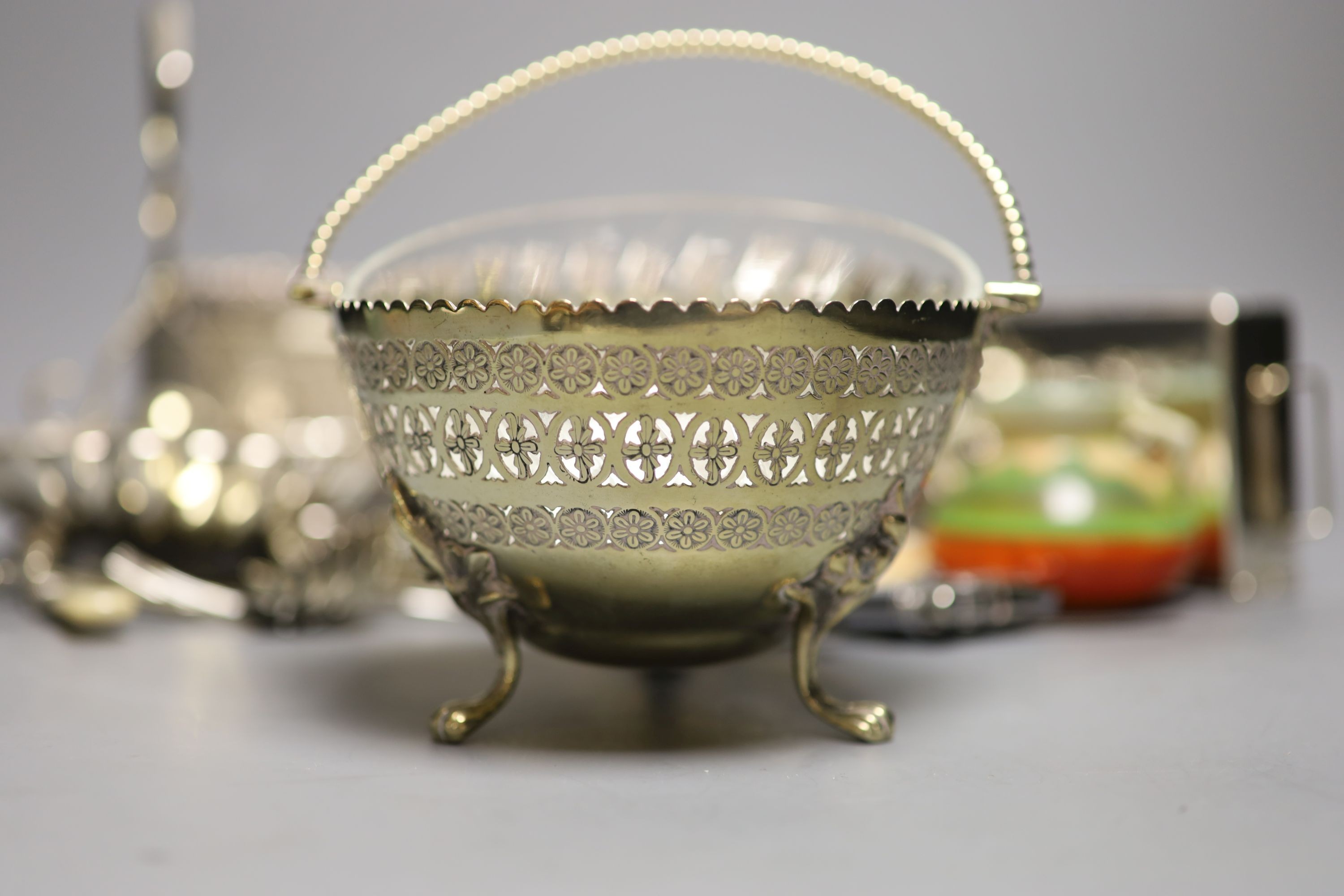 A collection of silver plate to include an enamelled box, candle snuffers, cutlery, box etc